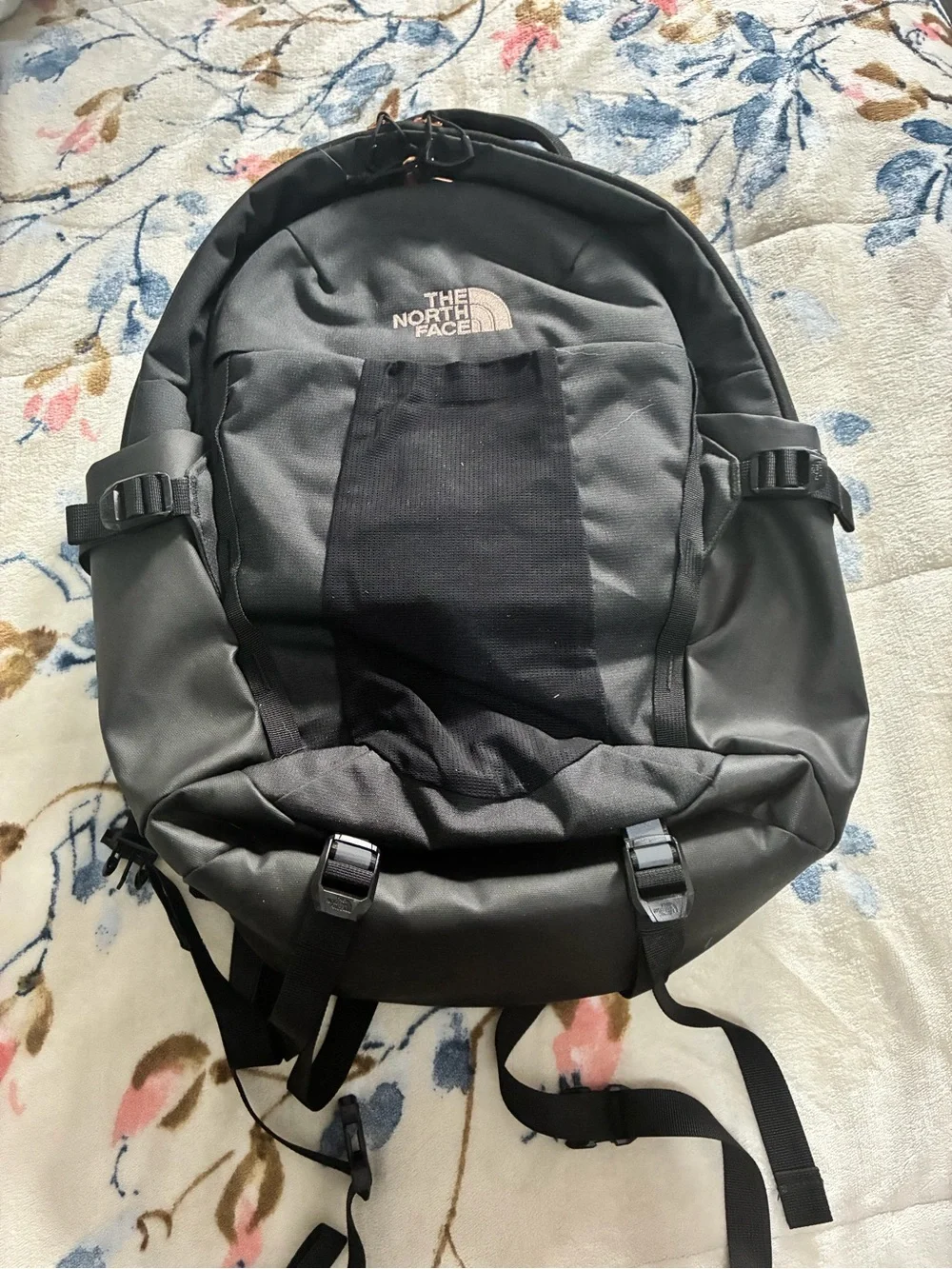 The North Face Black Backpack with Rose Gold Accents